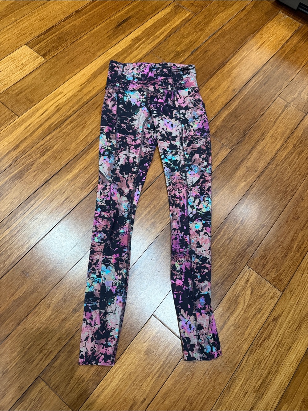 lululemon athletica Black Floral Splash Leggings with Pink & Teal Accents
